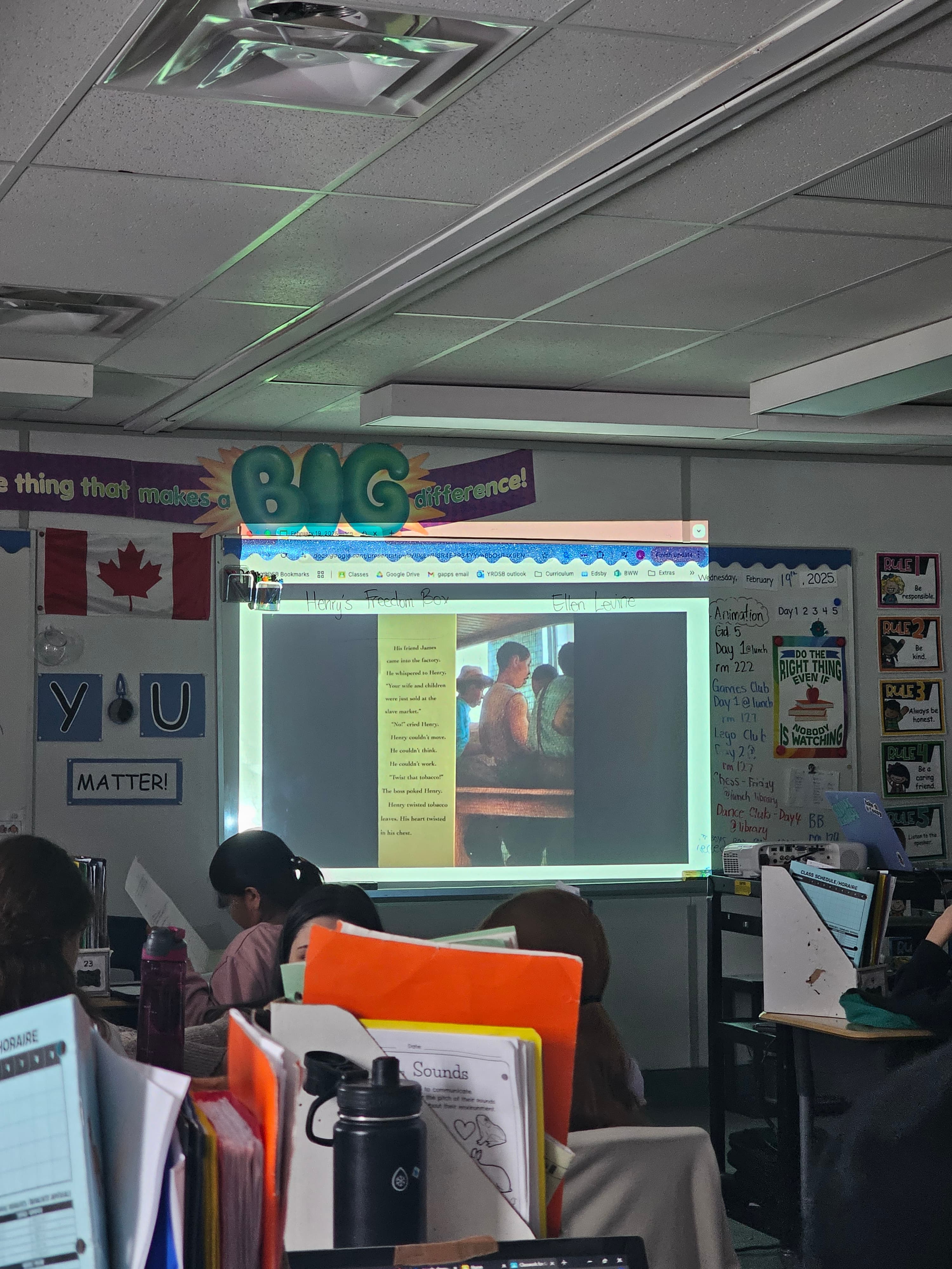 Read-aloud slide from Henry's Freedom Box projected during literacy instruction at Blue Willow Public School