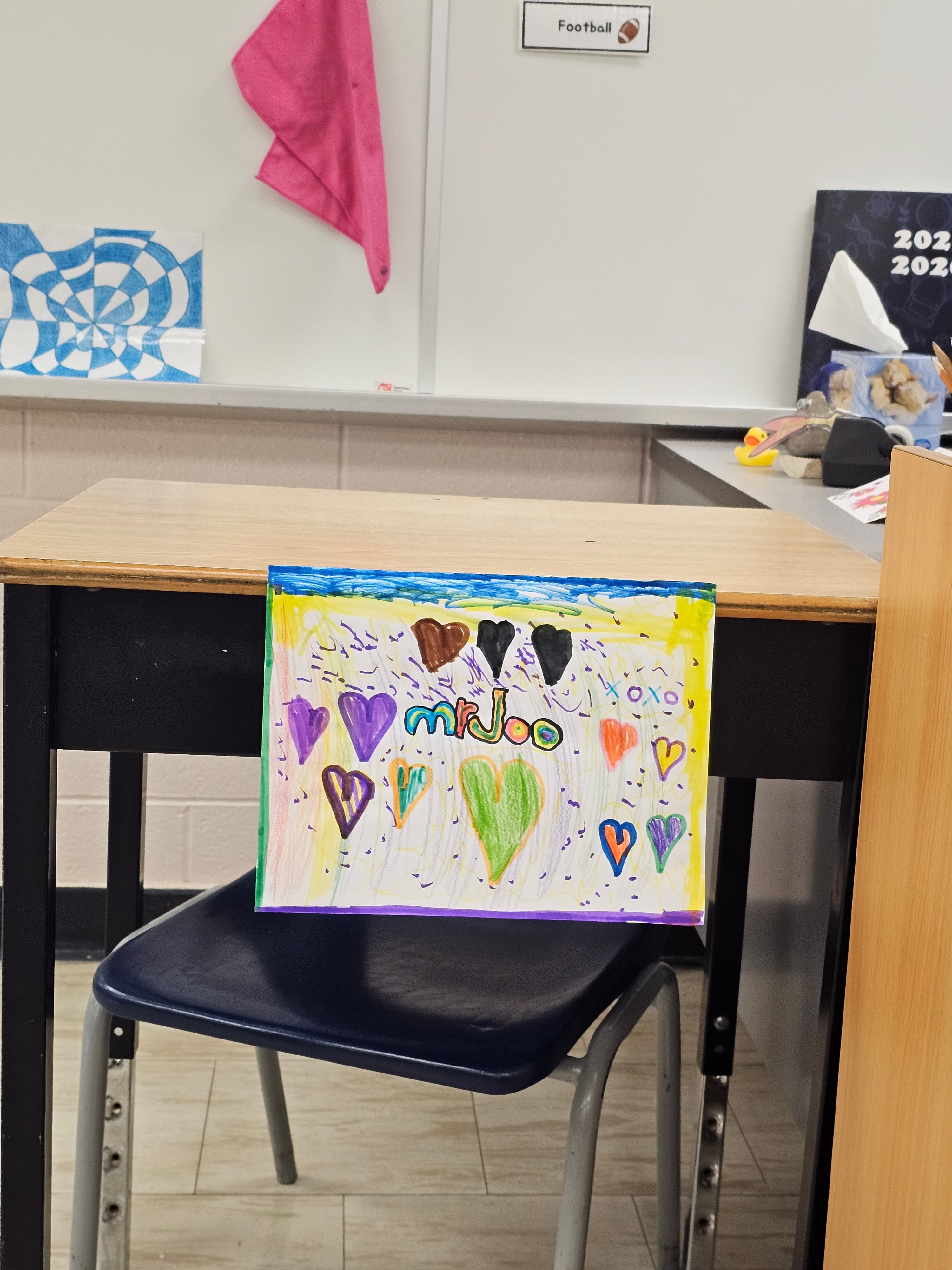 Hand-made student appreciation artwork addressed to Mr. Joo, resting on a classroom desk at Highview Public School